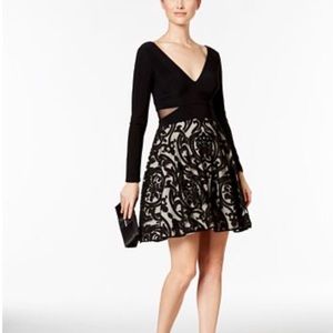 Xscape long sleeve black dress above the knee